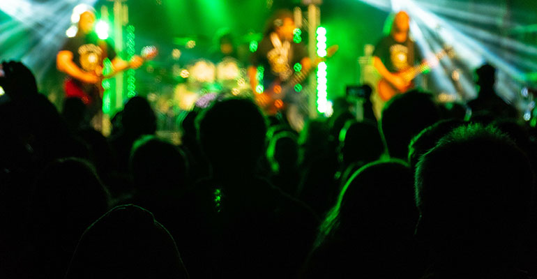 Wacken Festival- German music festival, green lights shine bright over rock music